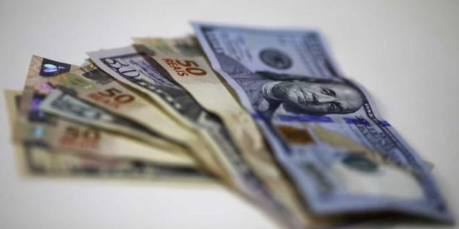 Dólar cai para R$ 5,03, um dia após Bancos Centrais definirem juros