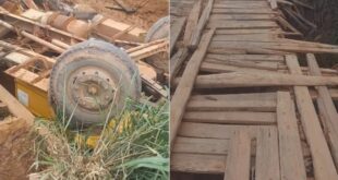  Caçamba tomba e fica de cabeça para baixo ao cair de ponte em Senador Guiomard