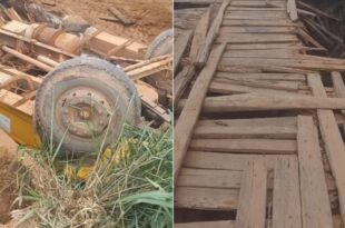  Caçamba tomba e fica de cabeça para baixo ao cair de ponte em Senador Guiomard