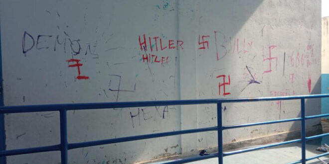 Escola de Contagem é invadida e pichada com frases e símbolos neonazistas