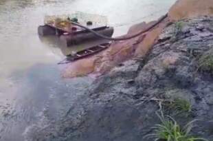 Crime ambiental: bomba de captação de água localizada ao lado de canal de esgoto