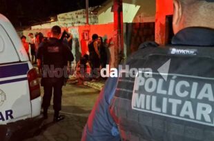 Homem é executado a tiros enquanto estava com criança de colo